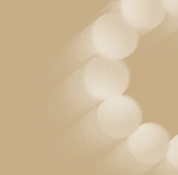 Soft focus lights on beige background, symbolizing tailored personal insurance solutions.
