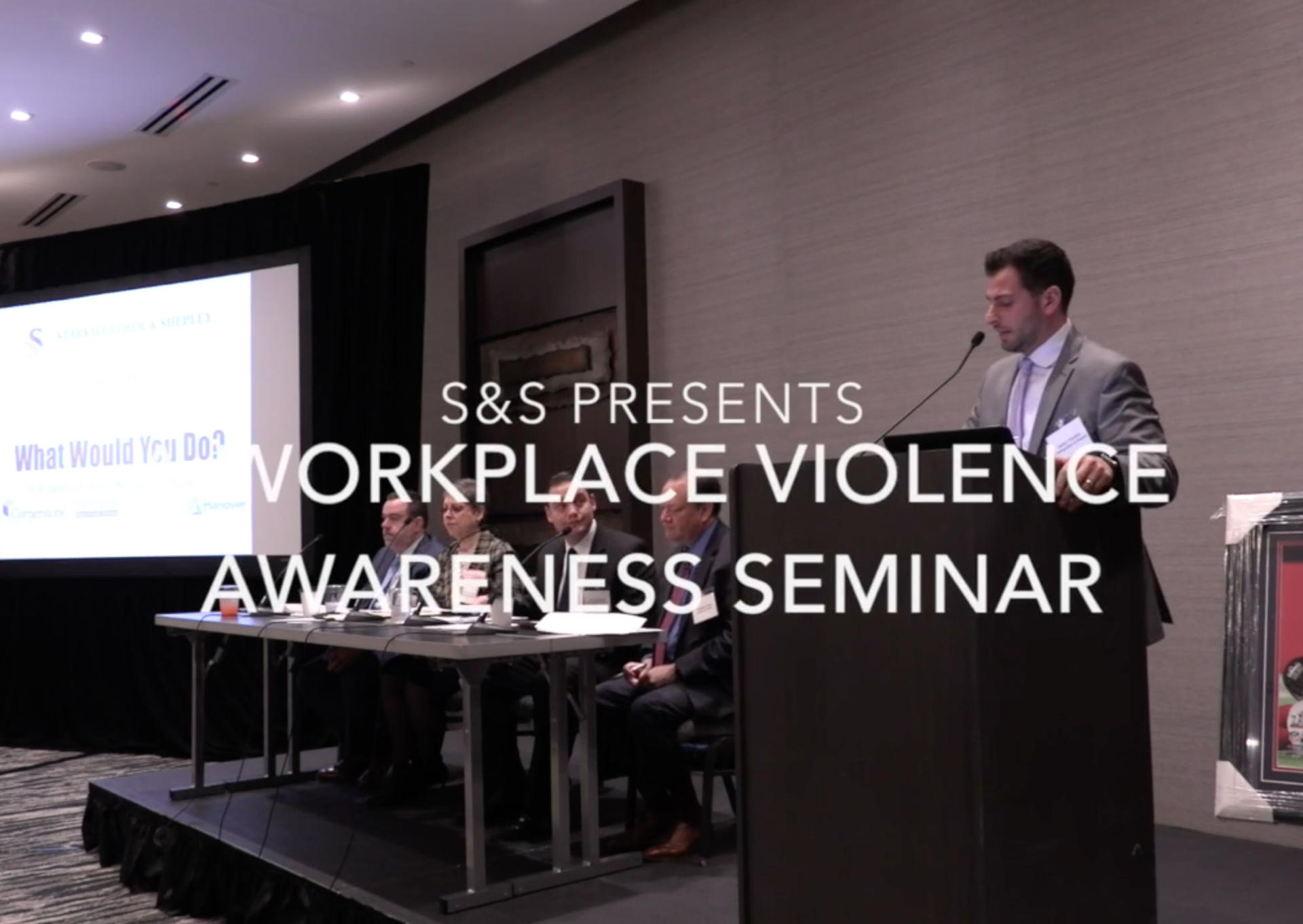 Workplace violence awareness seminar with speaker and panel discussion.