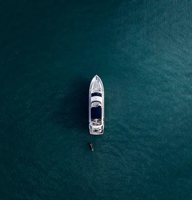 Luxury yacht at sea, representing ABYC Marine Artisan Insurance coverage for owned watercraft and liability solutions.